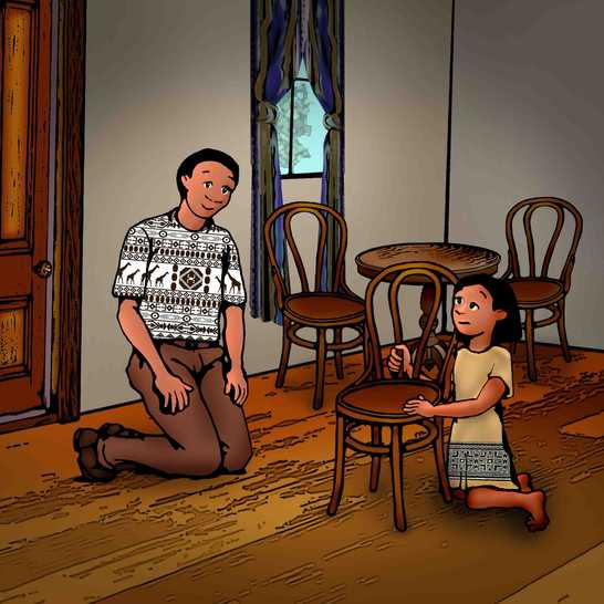 A man kneeling down talking to a girl.