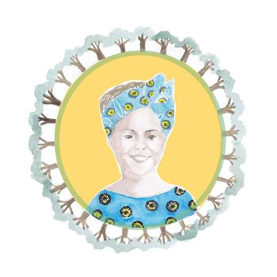 A woman surrounded by trees.