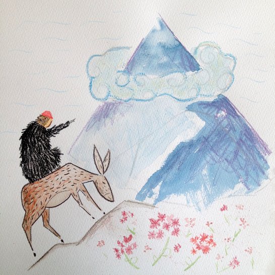 A man sitting on a donkey walking up a mountain.