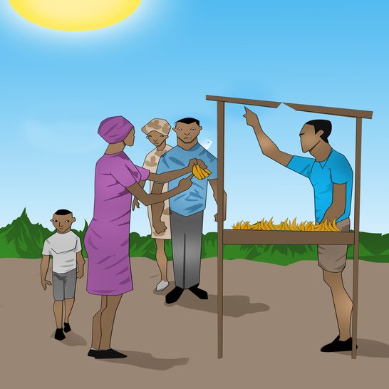 A woman holding up a bunch or bananas in a market.