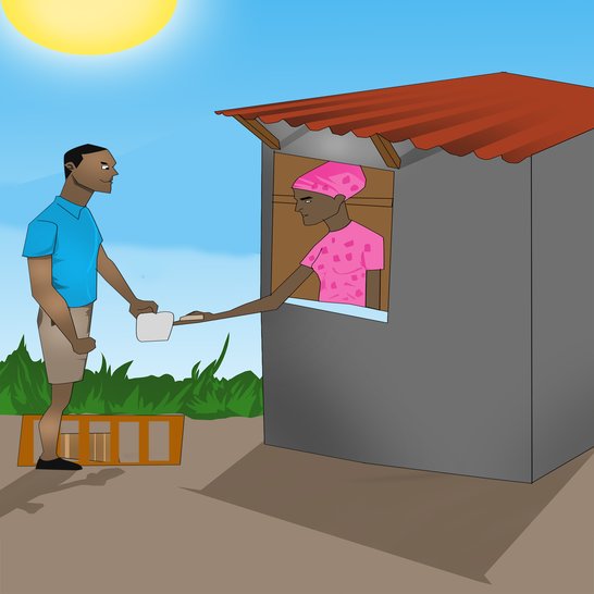 A man buying items from a market stall and putting them in a tray.