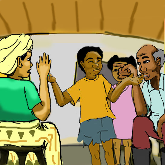 A boy talking to a man and woman and a girl standing next to them.